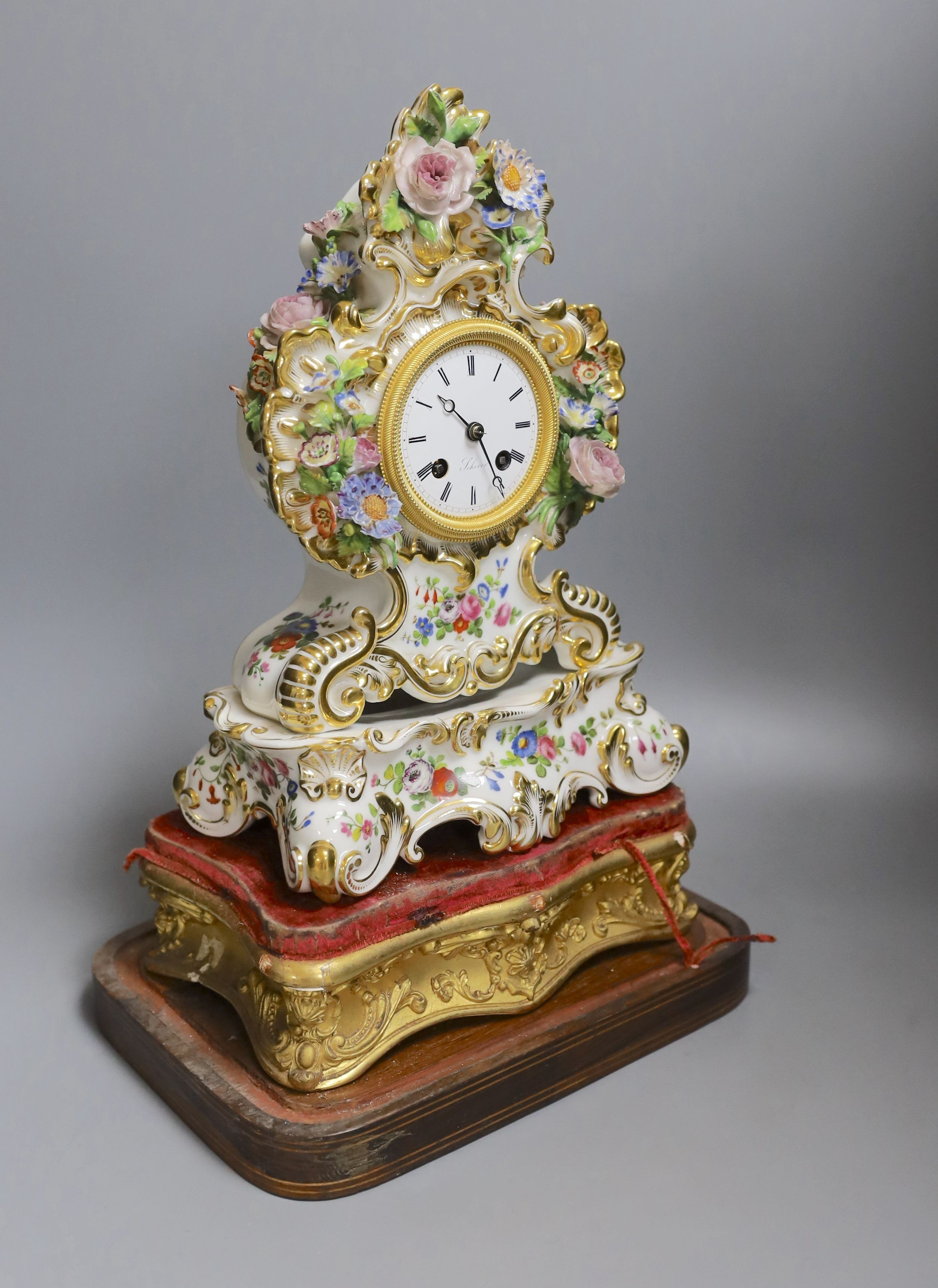 A 19th century French porcelain mantel clock, by Jacob Petit, in domed case - 45cm tall